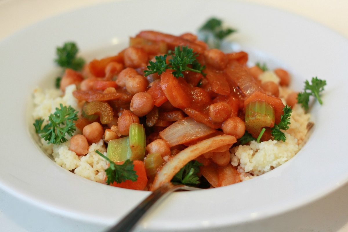 Chickpea and vegetable stew served over couscous